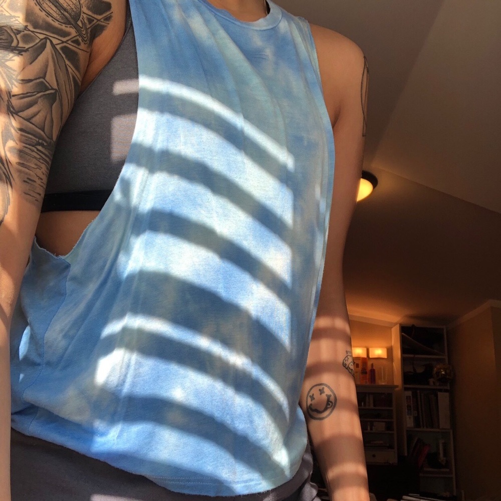 Light and flowy sky blue muscle tee